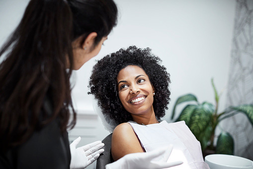 Woman in dental chair at Highridge Dental Care in Folsom, CA